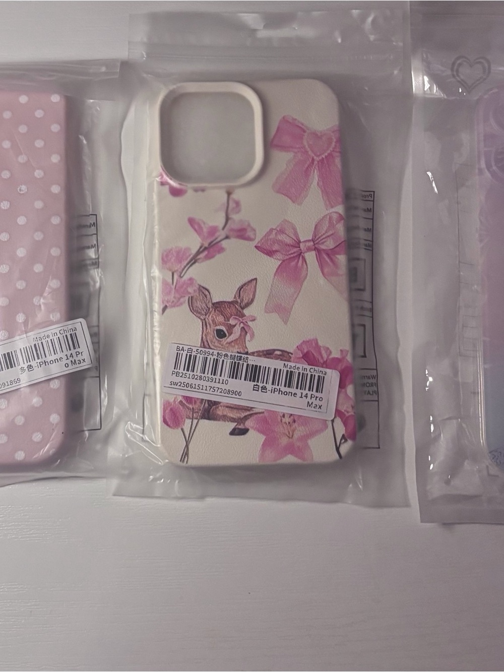 Three iPhone 14 Pro max phone cases
